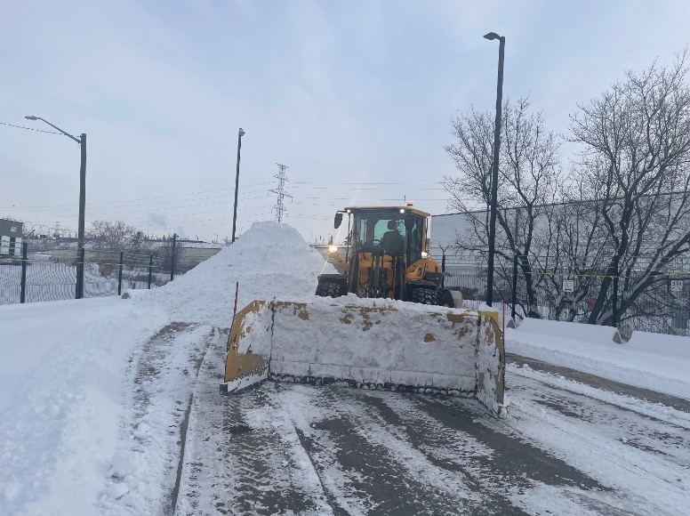 Loader clearing an access lane