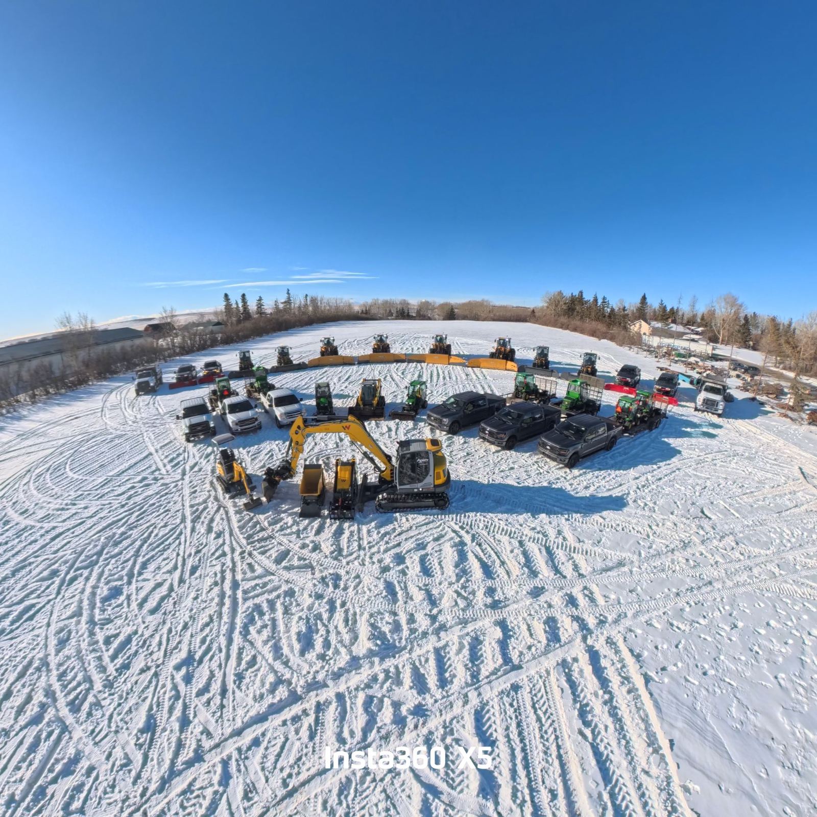 Adept fleet lined up in a snow-covered yard
